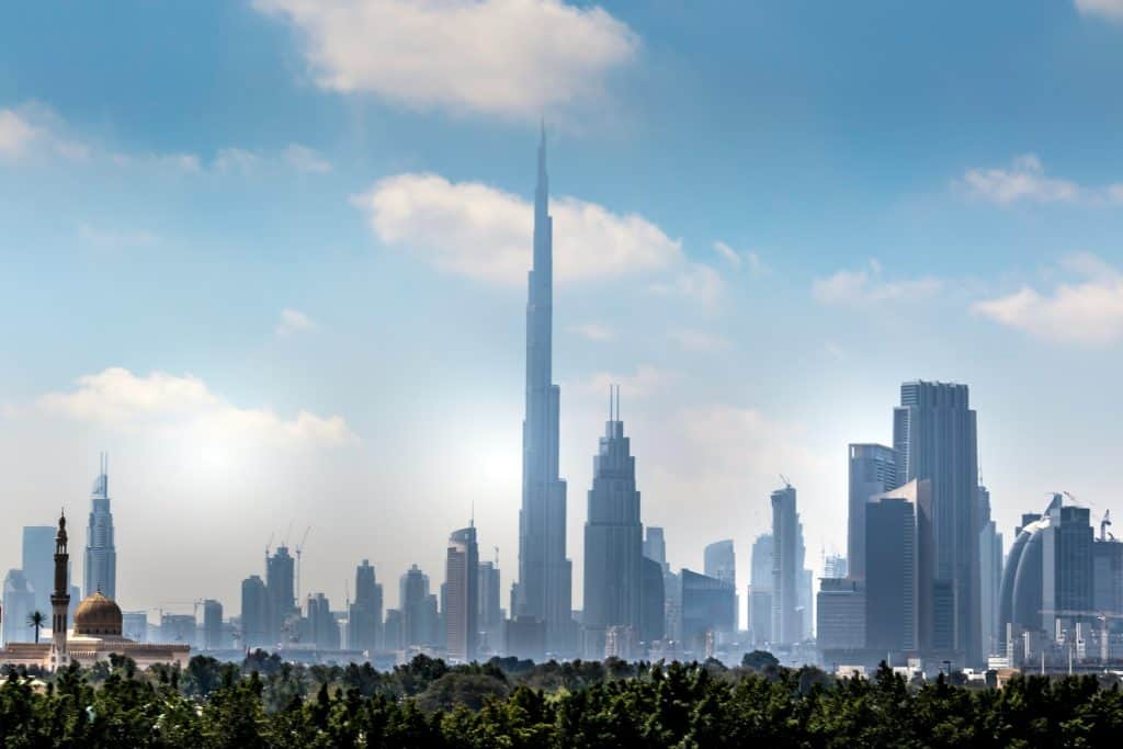 Dubai skyline featuring Burj Khalifa and modern skyscrapers.