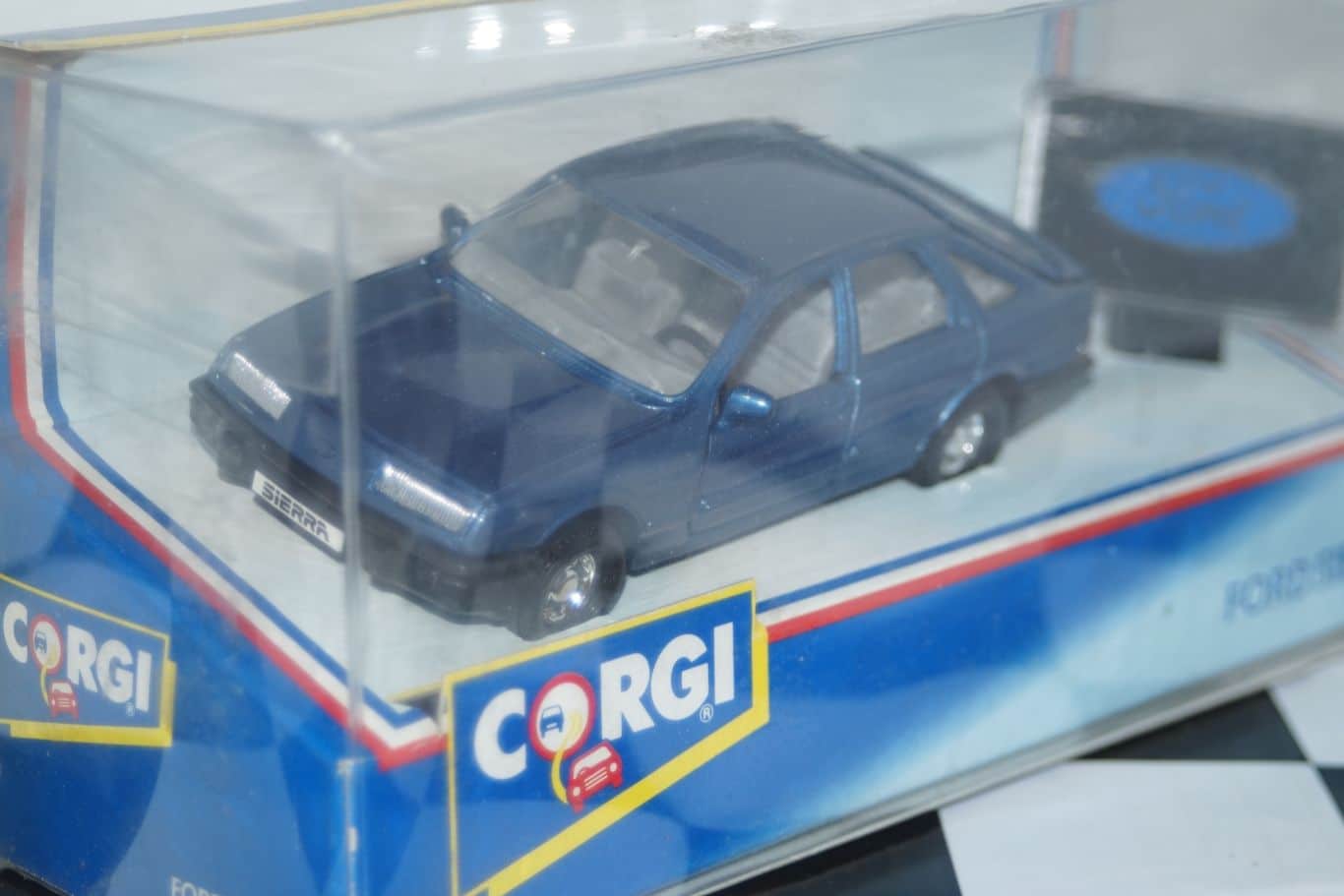 CorgiToysLeicesterFordsierraDoorBlue:th