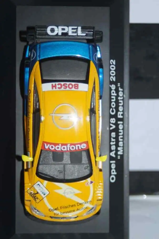 Schuco opel astra v8 coupe 2002 m.reuter diecast ltd 04803 1:43
