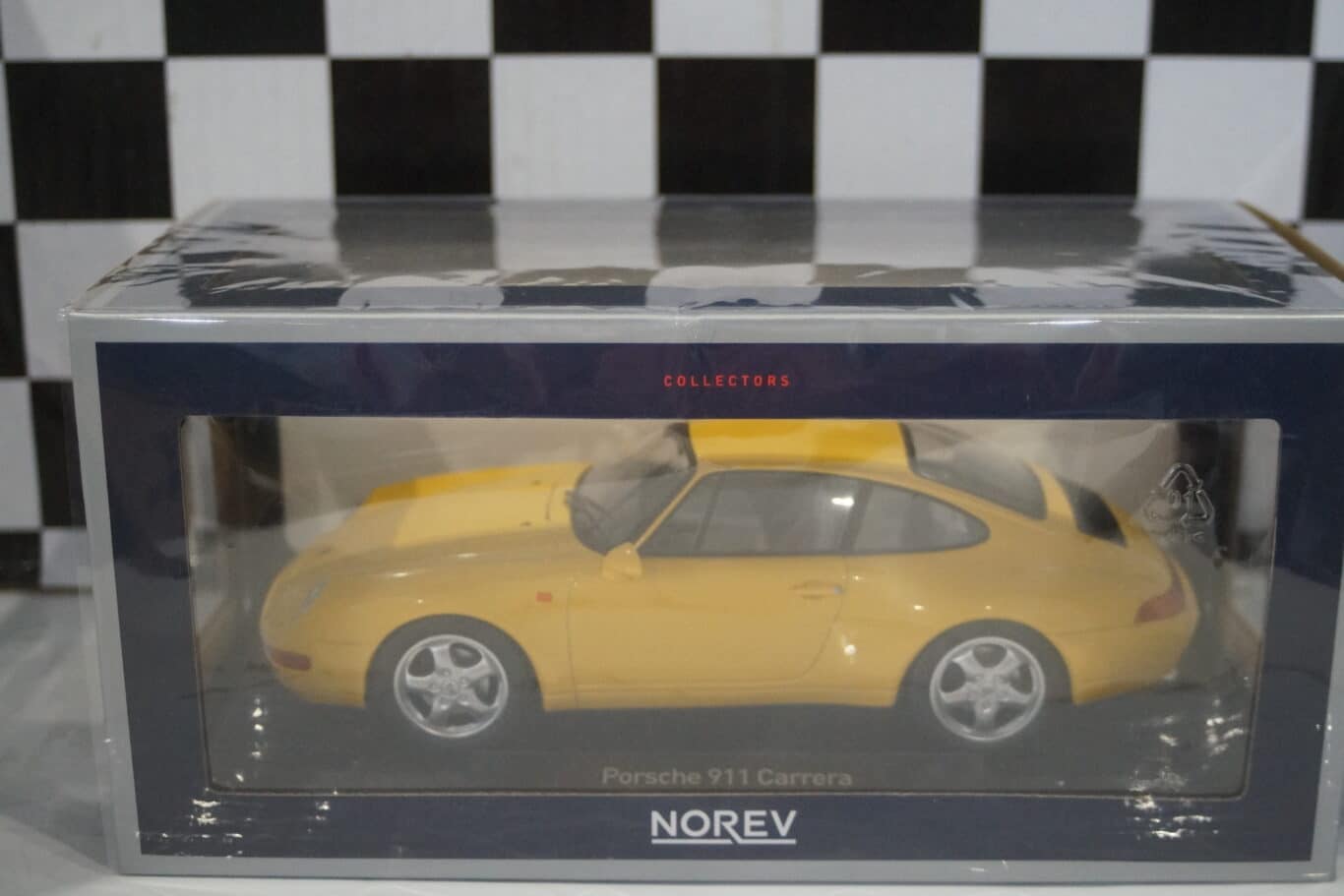 Norev  porsche 911 carrera coupe 1994 yellow 1:18 scale 187596