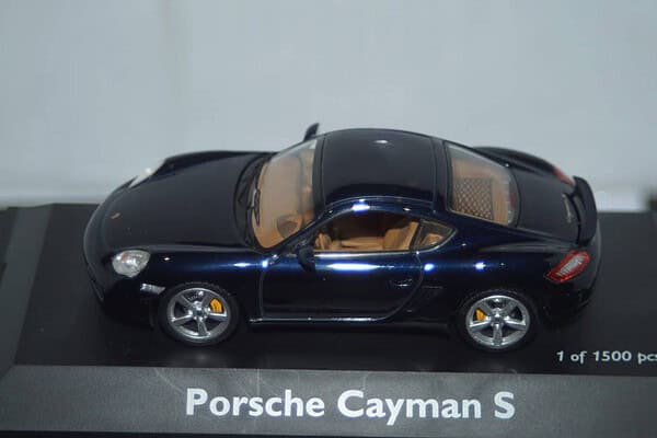 Schuco porsche caymen s in dark blue ref 04742 1/43
