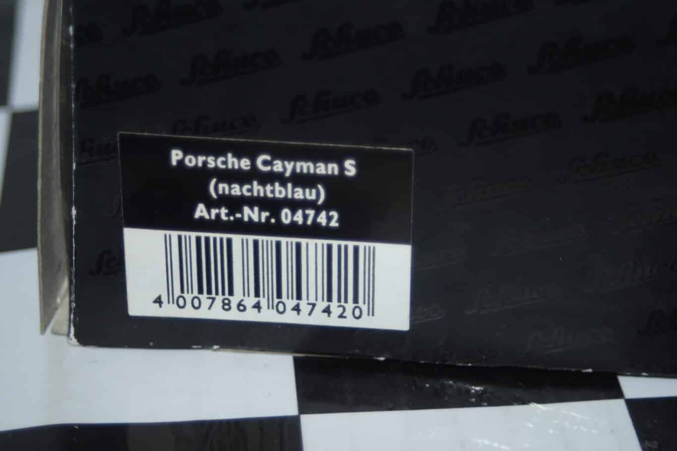 Schuco porsche caymen s in dark blue ref 04742 1/43