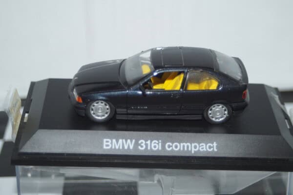 Schuco bmw 316i compact blue 1:43 scale diecast ref 04003 - cracks in case