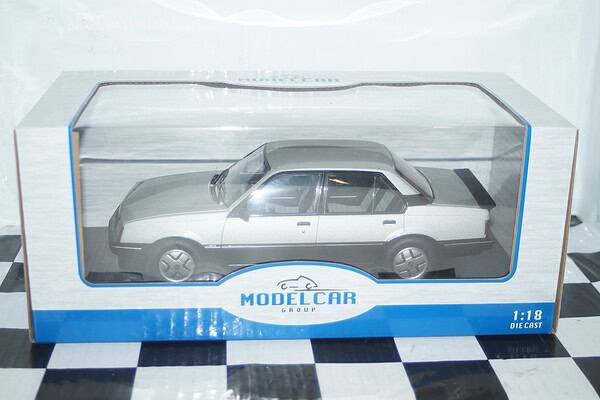 Model car group opel ascona / cavalier c sr 1981 in silver mcg18460 1:18th