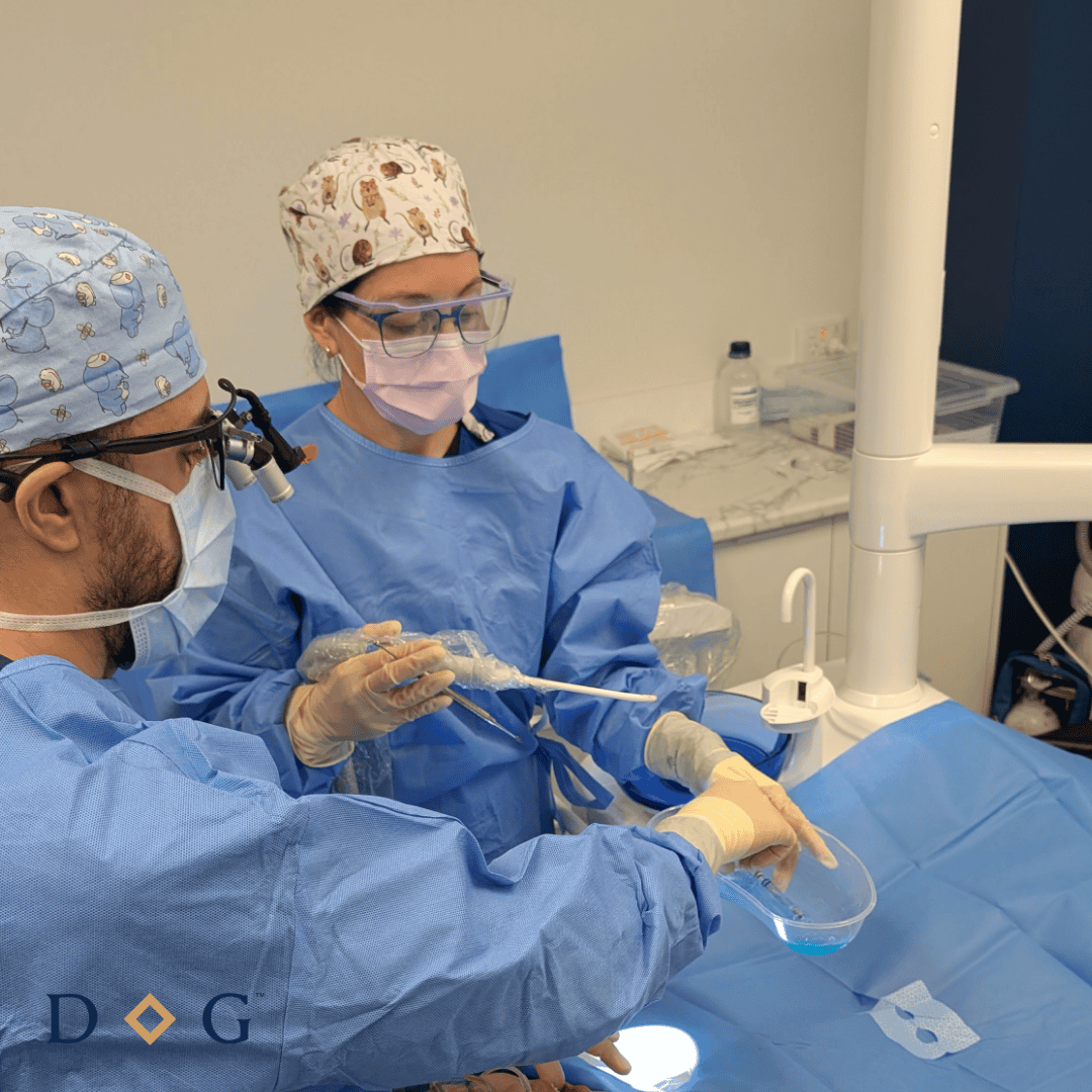 dentist and dental assistant performing dental work on a patient in Brisbane CBD dental clinic