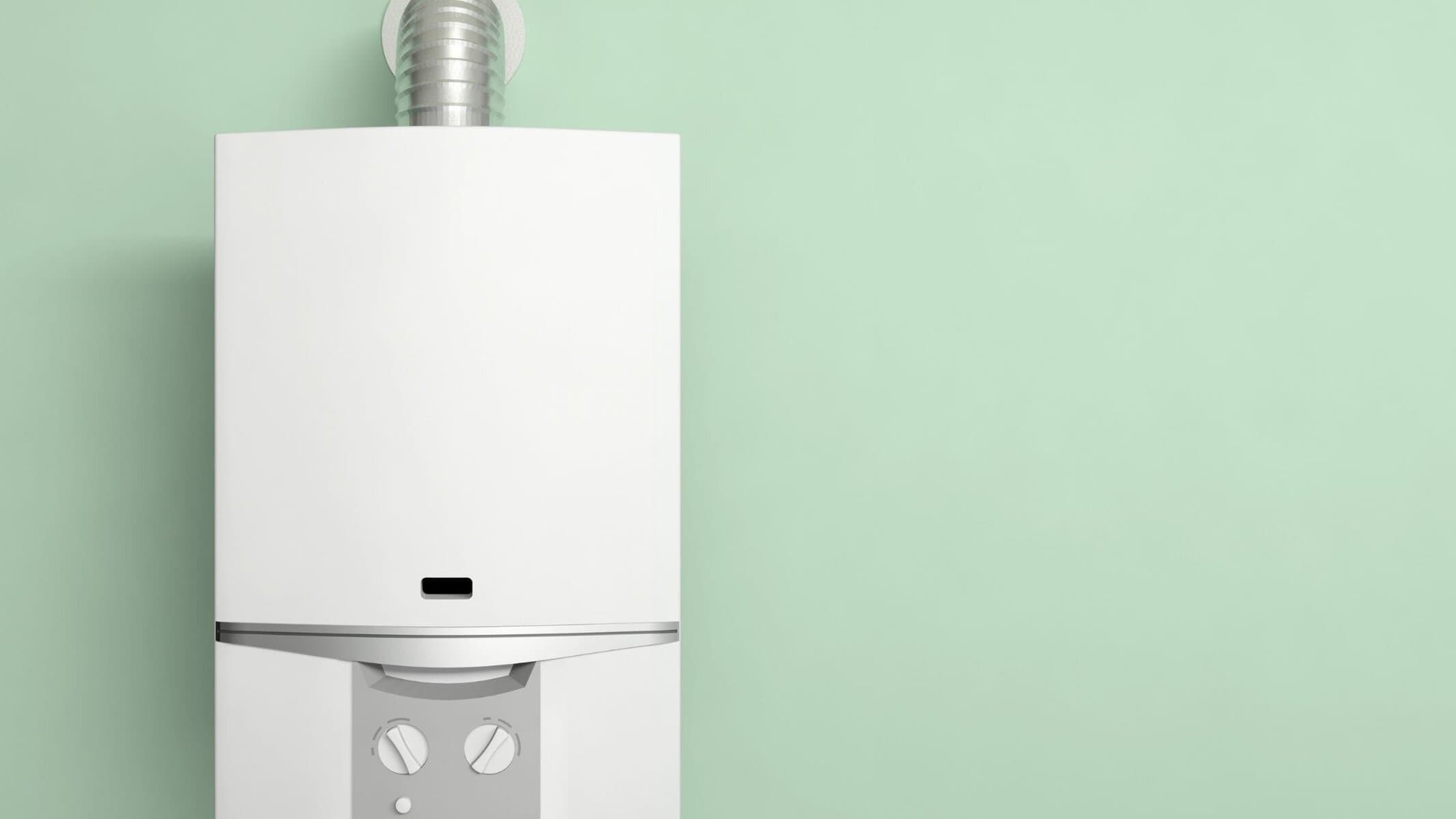 White gas boiler with vent pipe, mounted on a light green wall background.