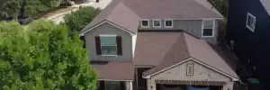 Finished home roof restoration following storm damage repair by Dolan Roofing & Construction