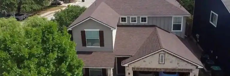 Finished home roof restoration following storm damage repair by Dolan Roofing & Construction