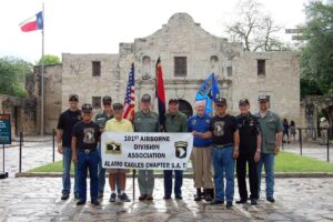 Group photo outdoors of Alamo Eagles 101st Airborne Division Dolan Roofing & Construction in San Antonio, TX