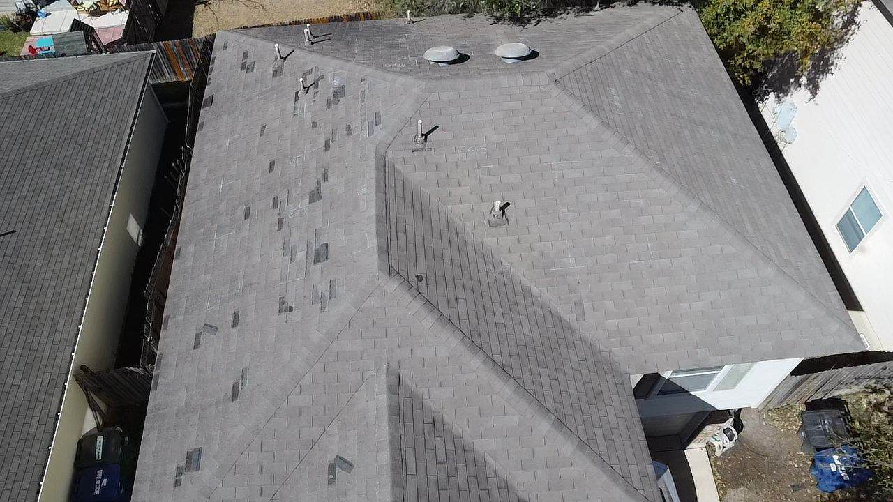 Severe roof damage on a San Antonio home after a storm