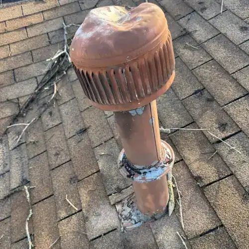 Hail-damaged roof vent in San Antonio shown during a professional hail damage roof inspection