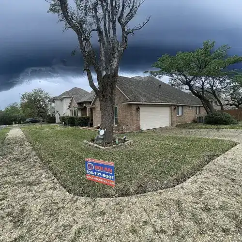 Storm clouds over a residential home with Dolan Roofing & Construction sign, emphasizing Texas storm roof inspection in San Antonio