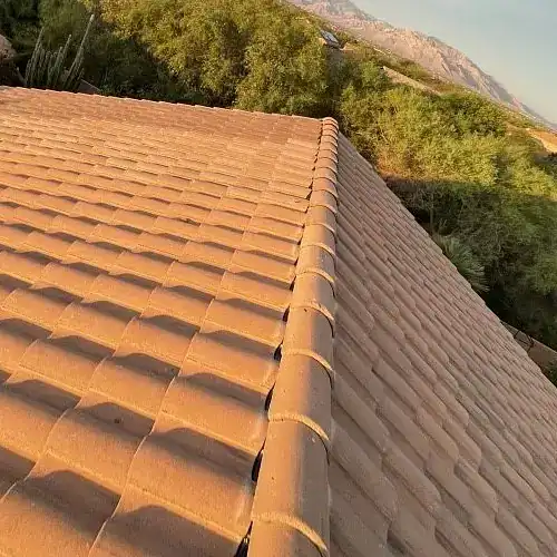 Newly finished tile roof after lift and relay project, showcasing clean tile alignment and secure ridgeline by Dolan Roofing & Construction in San Antonio