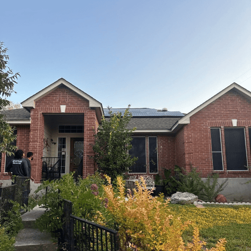 New GAF Timberline HDZ roof installed on red brick home by Dolan Roofing & Construction in Helotes