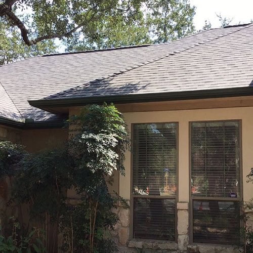 Newly installed Owens Corning Oakridge roof showcasing upgraded drainage and curb appeal by Dolan Roofing & Construction in Timberwood Park