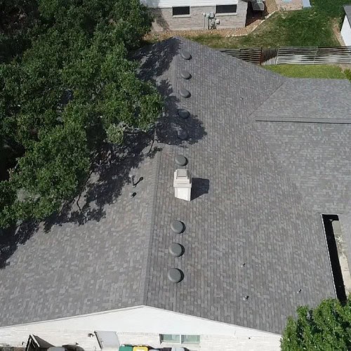 Finished roof with Owens Corning Oakridge shingles at 8518 Marathon Drive by Dolan Roofing & Construction in Universal City