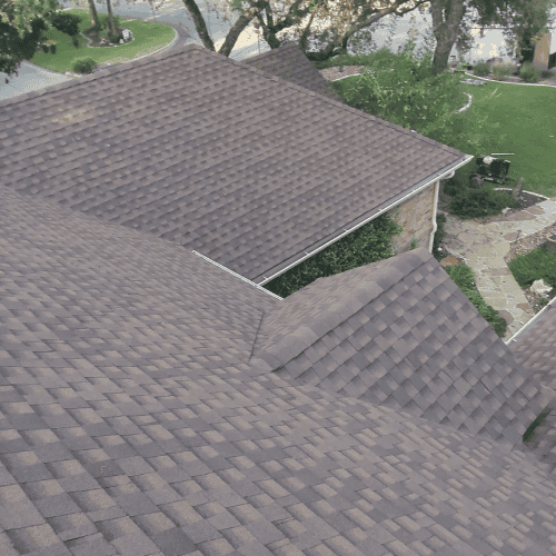 Close-up of new GAF Timberline HDZ shingle roof completed by Helotes Roofing Contractor Dolan Roofing & Construction