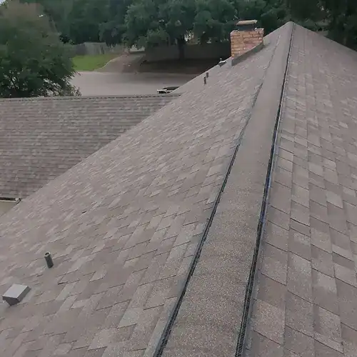 Roof ridge restored during roof repair project by Dolan Roofing in Seguin, TX