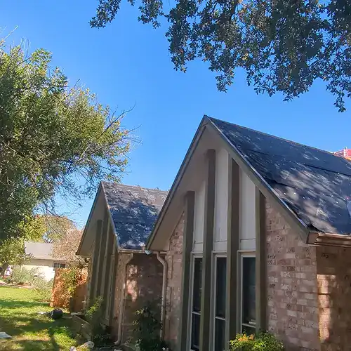 Roof restoration underway on residential home by Dolan Roofing in Seguin, TX