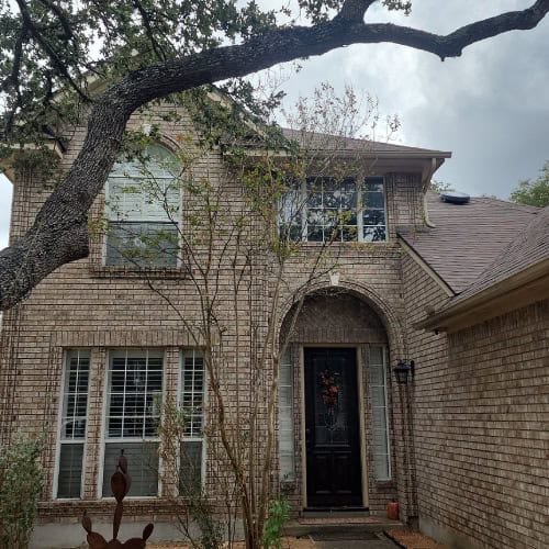 Newly replaced architectural shingle roof on a Deer Creek home by Dolan Roofing & Construction in Cibolo
