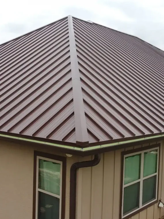 Durable metal roof installation on a San Antonio home by Dolan Roofing & Construction,