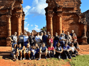 Group of tourists exploring historic ruins in Uruguay.