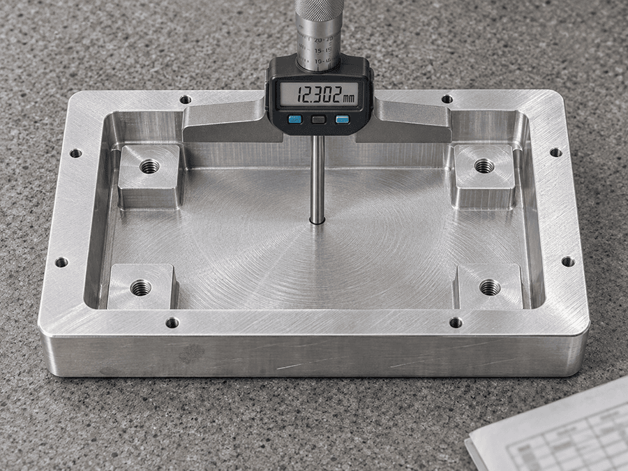 6061-T6 aluminum optical-sensor enclosure 180x120x42 mm with pocket floor and four mounting pads, illustrating the G54 work offset error case study on a Haas VF-2SS