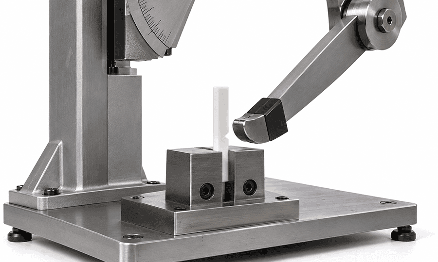 Izod impact test pendulum striking a vertically clamped notched plastic specimen