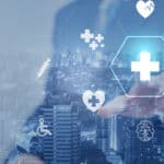 Medical Healthcare and Medicine Concept - Doctor in hospital with digital medical icons graphic interface showing symbol of medicine, health care people