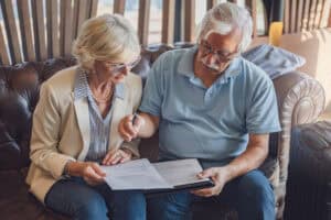 Senior couple looking at documents