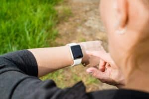 woman checking apple watch