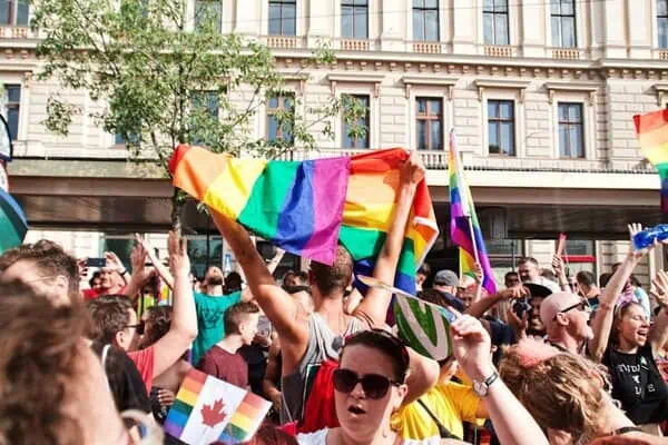 people gathering near building during daytime