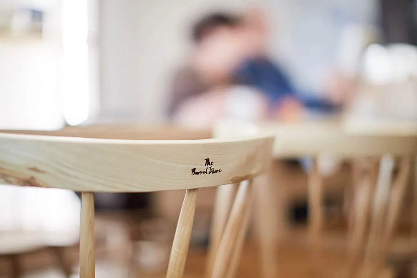 A close-up of sleek wooden chairs with 