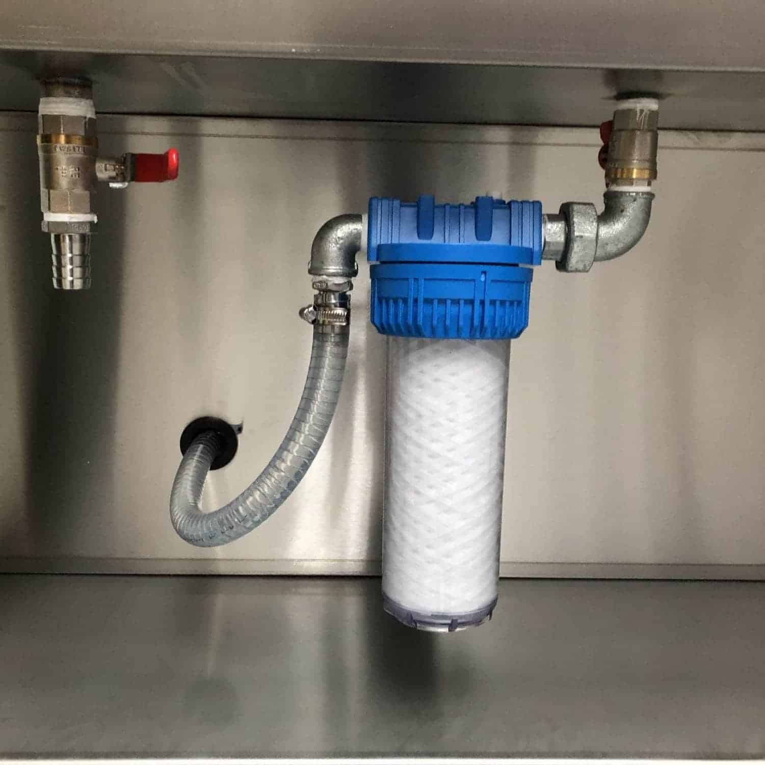 Hochdruck-Pinselwaschtisch - Mediumfiltration über über Kerzenfilter