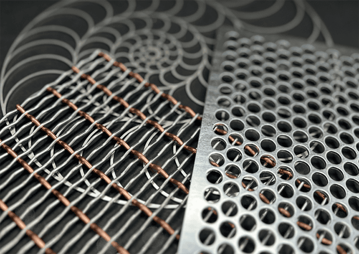 close up of anti-slip perforated flooring with colour grip paint in metal colour
