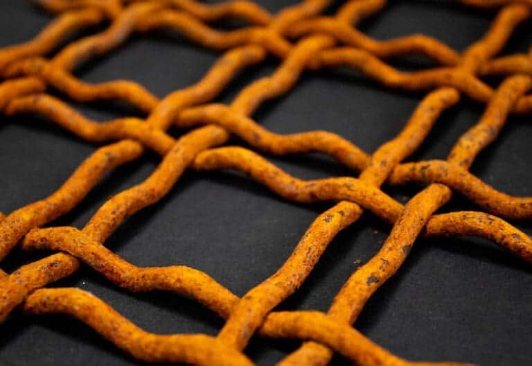 close up of woven wire corten