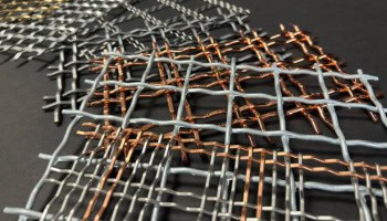 Woven wire mesh samples in different patterns and finishes of mesh