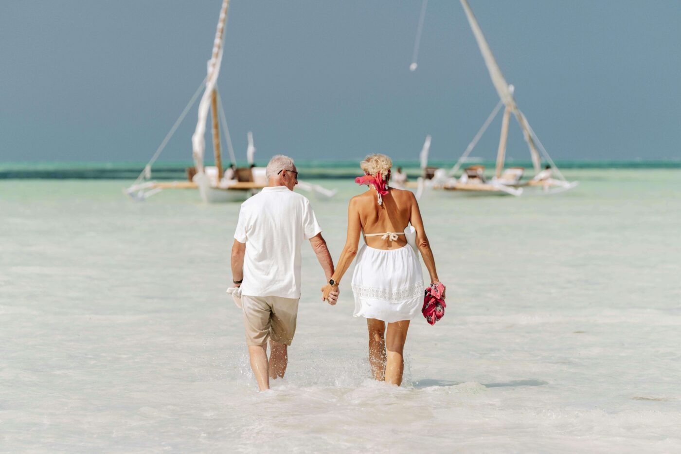 High-net-worth retirement planning couple on the beach