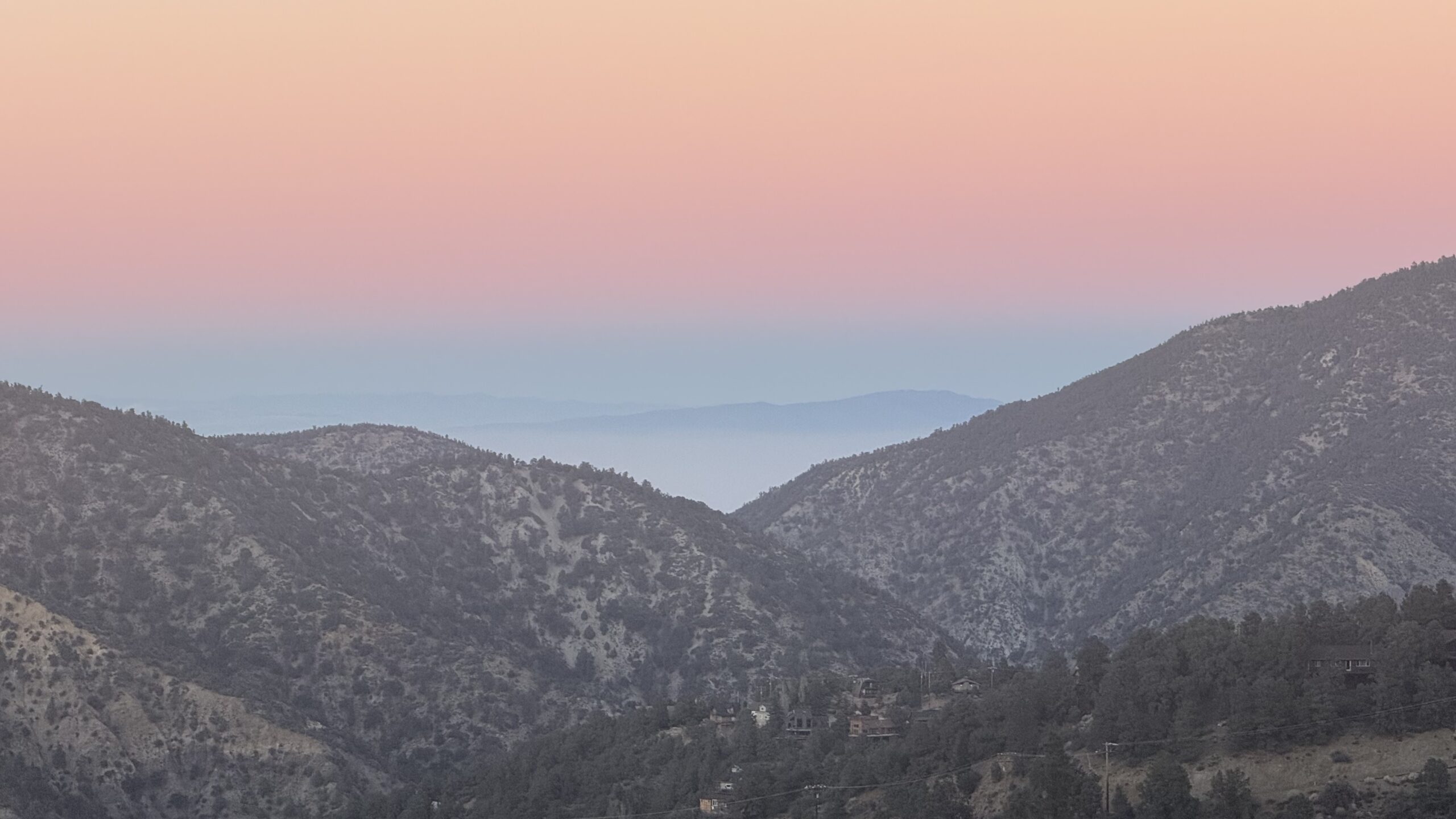 Sunset over mountain landscape with colorful sky