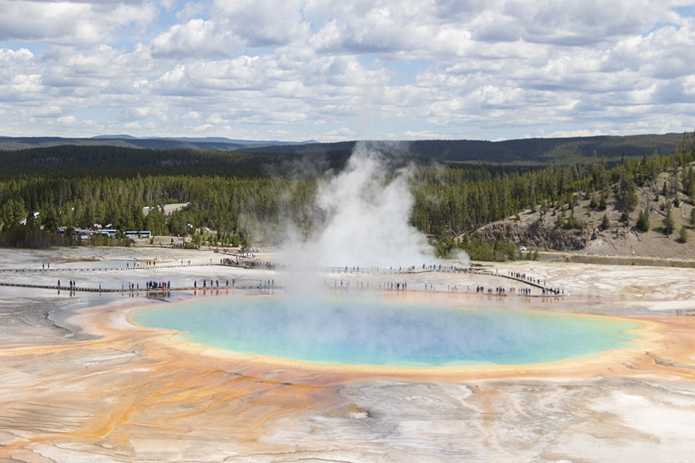 20 Easy Hikes In Yellowstone National Park You Don’t Want to Miss Overhead view of the colorful Grand Prismatic Hot Spring