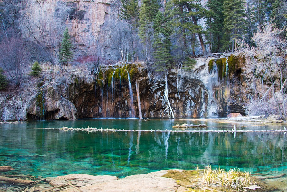 100 Hiking Quotes for Instagram That Aren’t Overused A view of Hanging Lake in Colorado