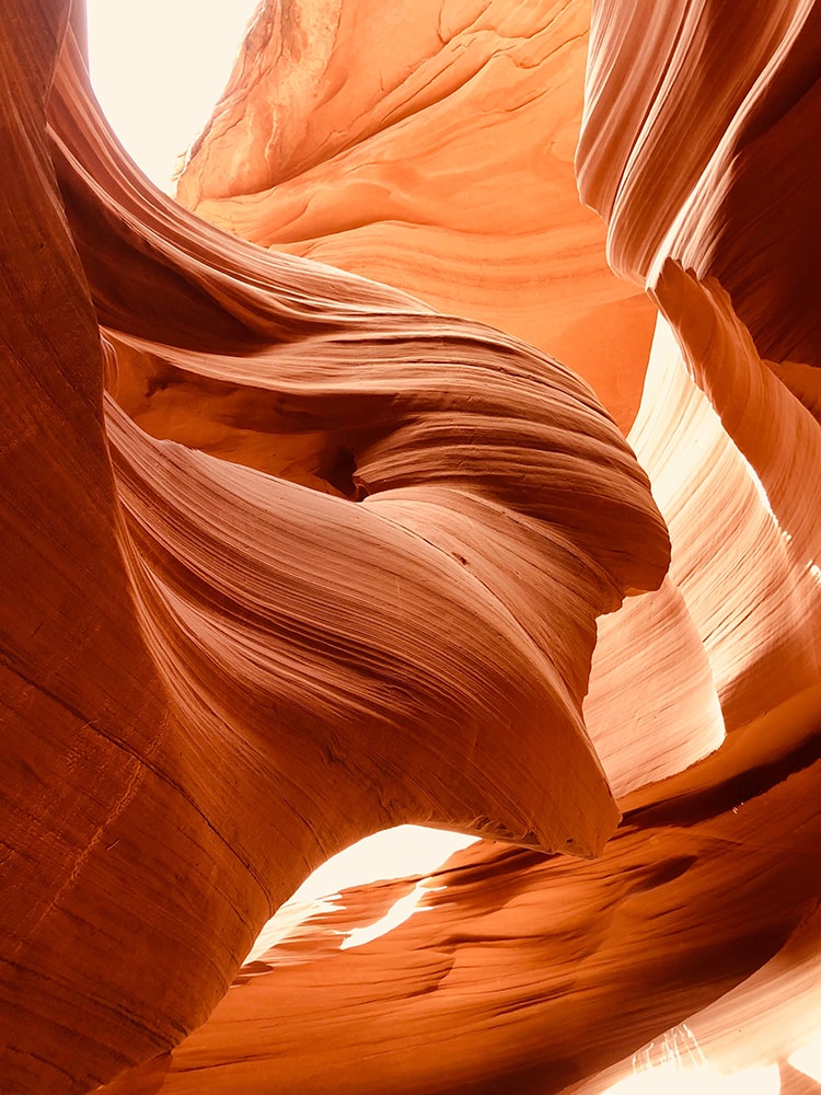 Utah National Parks Road Trip – The Perfect Itinerary Lady in the Wind in lower Antelope Canyon