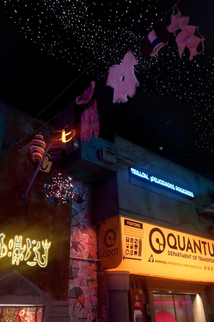 Meow Wolf Denver: The Ultimate Experience Guide for All Ages Clothes hanging from the ceiling at Meow Wolf Denver