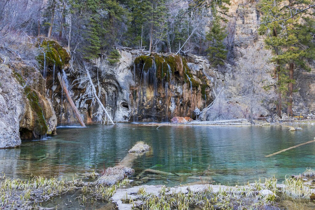 Hiking Hanging Lake in Colorado – The Ultimate Guide Another view of the beautiful Hanging Lake and it's blue water.