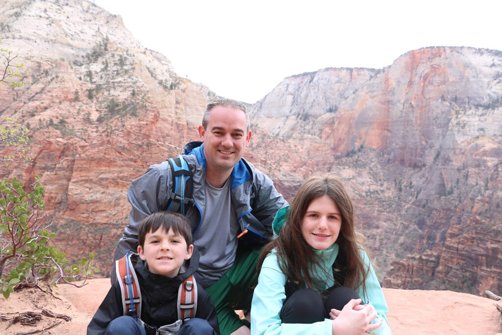 Your Epic 1 to 5 day Zion National Park Itinerary Awaits Family taking in the beautiful view of Zion National Park.
