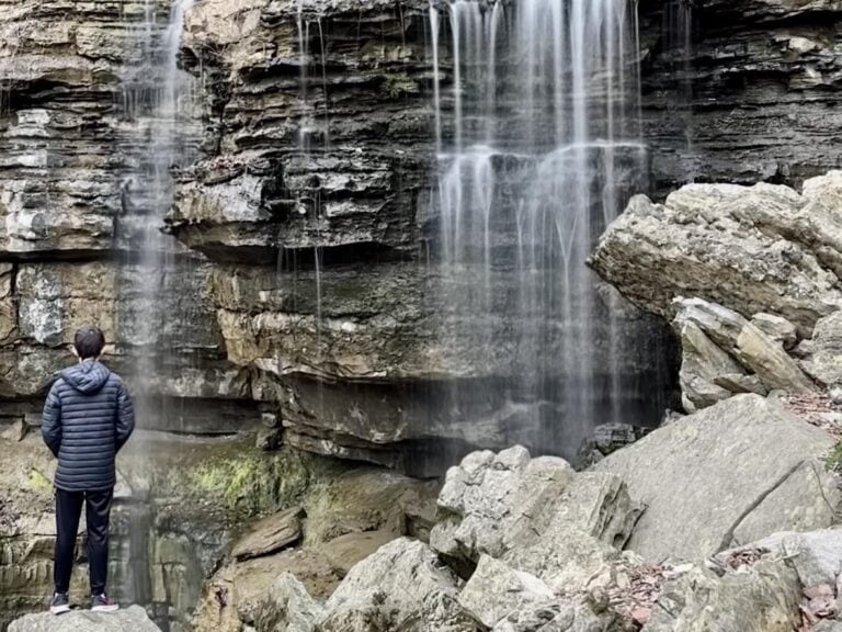 Bethel Spring Falls flowing down into a cave.