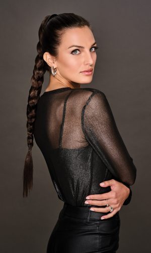 Braid Me Up Pony wig styled in a sleek, long braid perfect for elegant looks. High-quality synthetic.