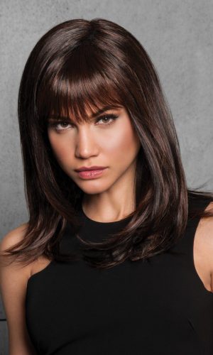 Long layered wig with rich brown color and soft bangs for a natural look.