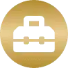 A gold circle with a black and white graphic of a stylized crown in the center.