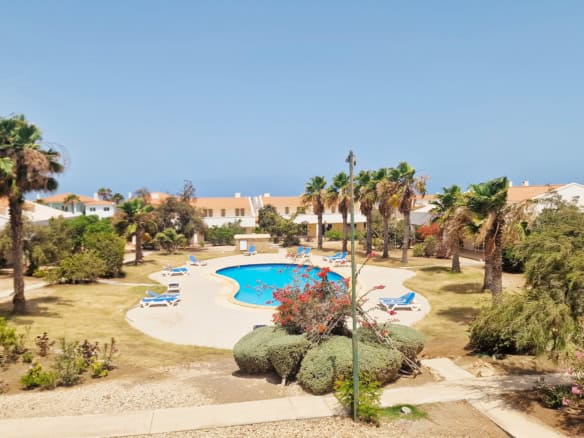 Terrace view: Paradise Beach: 3 Bed Poolside Townhouse